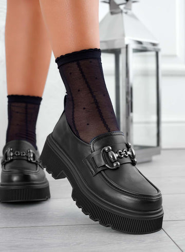 Black platform loafers with buckle