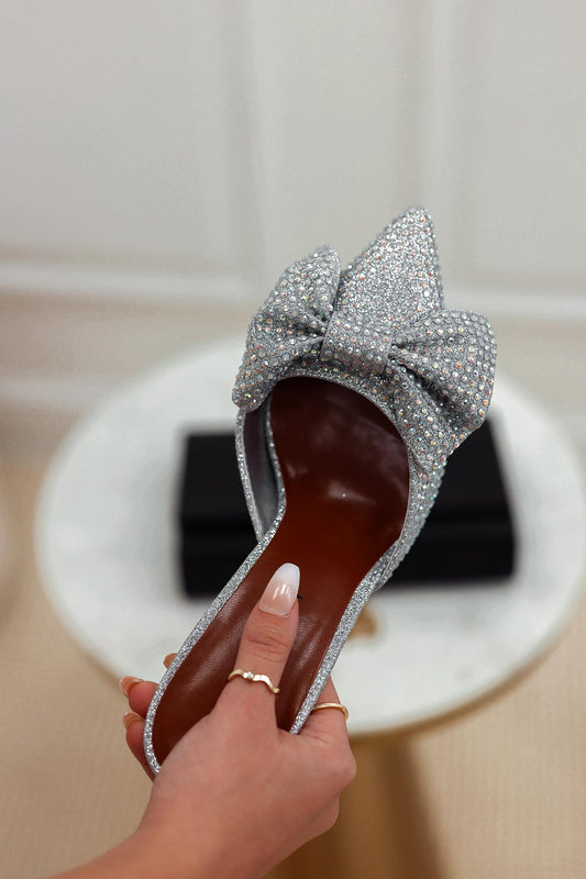 JUSTINE - Silver pumps with open back bow and rhinestones