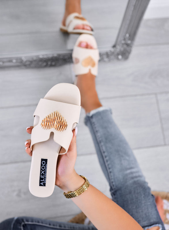 IGGY – Beige slide sandals with gold heart appliqué