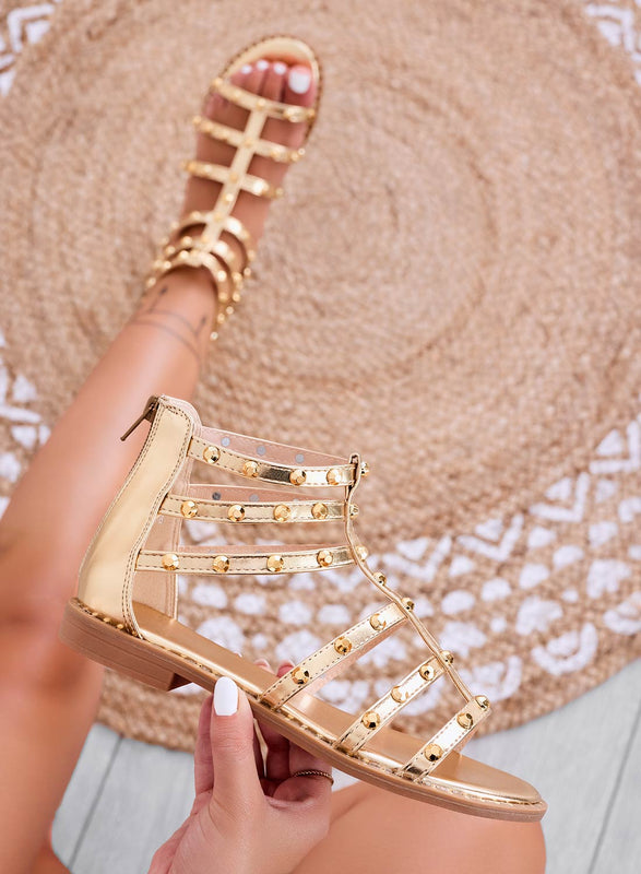 GAIA - Low gold sandals wrapped with studs