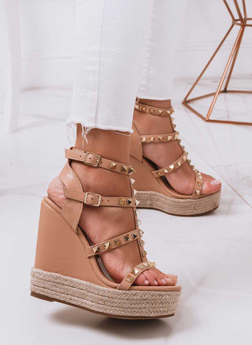 Beige wedge sandals with laces and gold studs