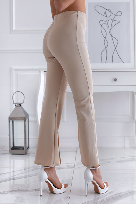 Beige flared trousers with front slit