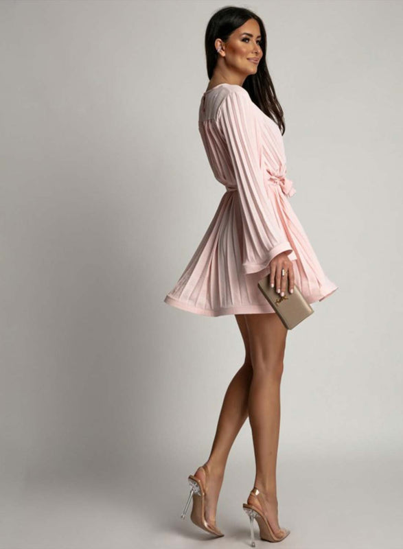 Pink pleated dress with a waist tie