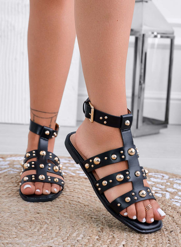 EULALIA - Black flat sandals wrapped with gold studs