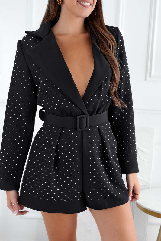 Black short jumpsuit with deep neckline and rhinestones