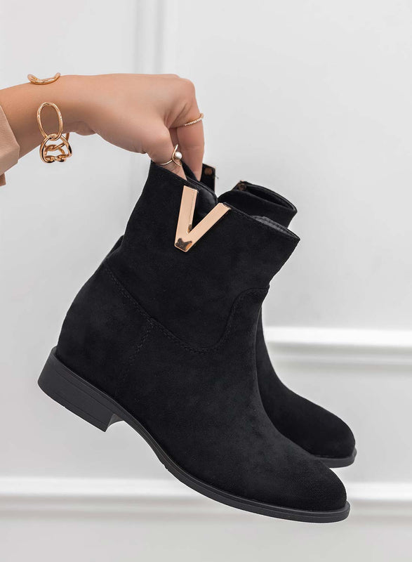 Bottines noires en daim avec semelle compensée intérieure