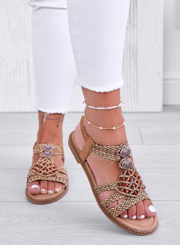 SIBILLA - Low mud sandals in woven fabric and shells