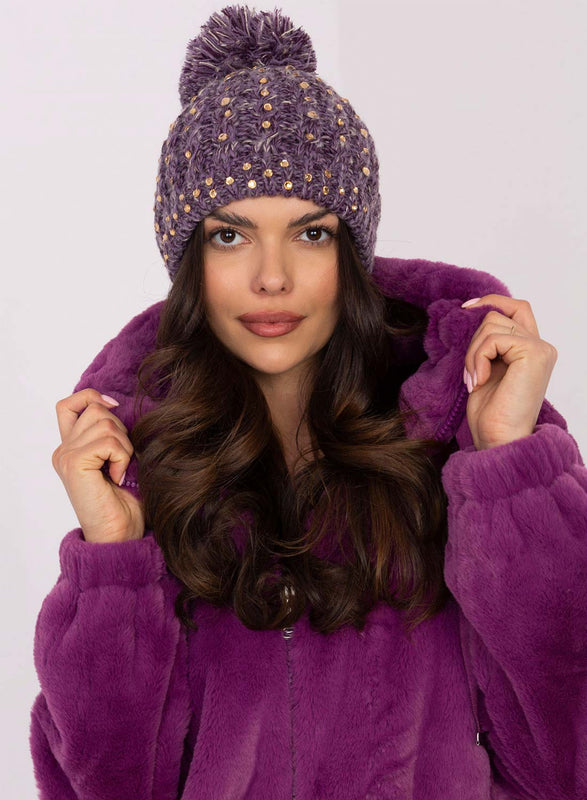 Purple padded hat with rhinestones and pompom