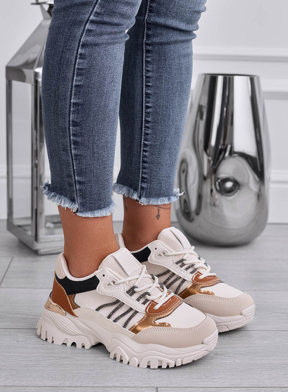 Zapatillas beige con detalles marrones