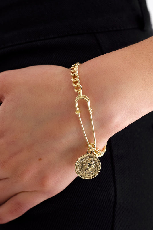 Gold bracelet with pendant