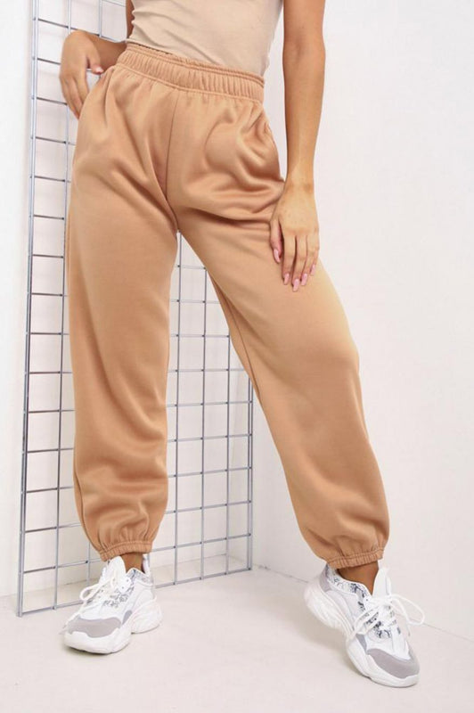 Camel jumpsuit trousers with pockets and springs