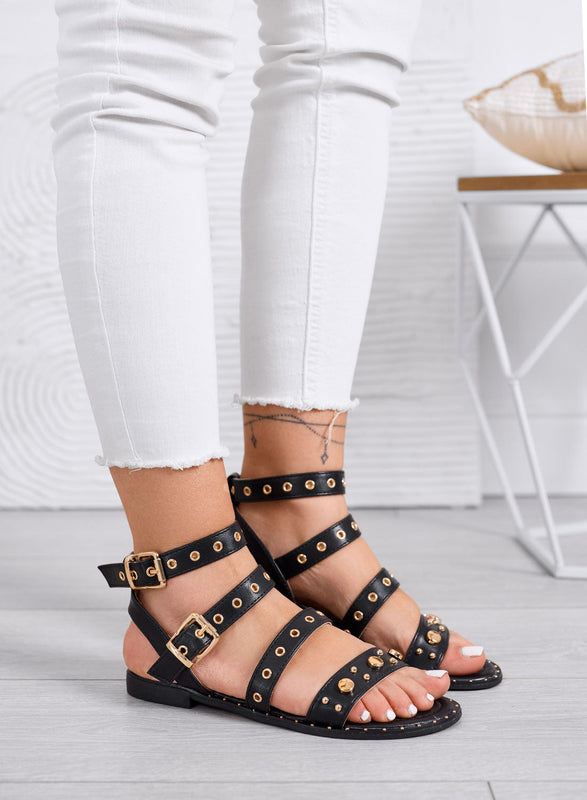 LILY - Black low sandals with snake print effect, studs, and buckles