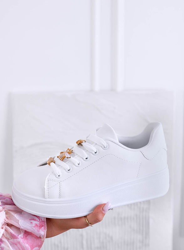 White sneakers with jeweled bee