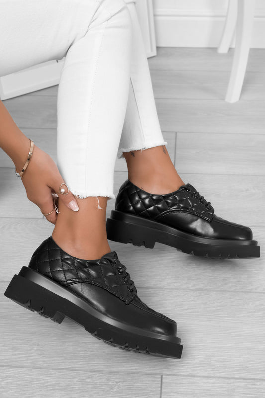 GIOVANNA - Black loafers with quilted details and laces