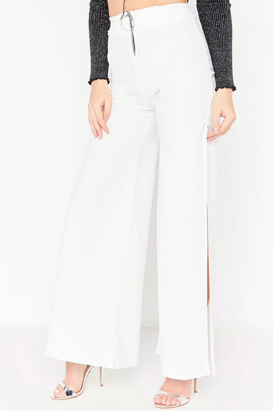 White trousers with zip and side slits