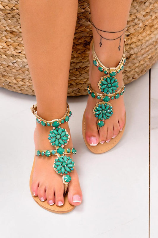 DENISE -  Golden thong sandals with green rhinestones