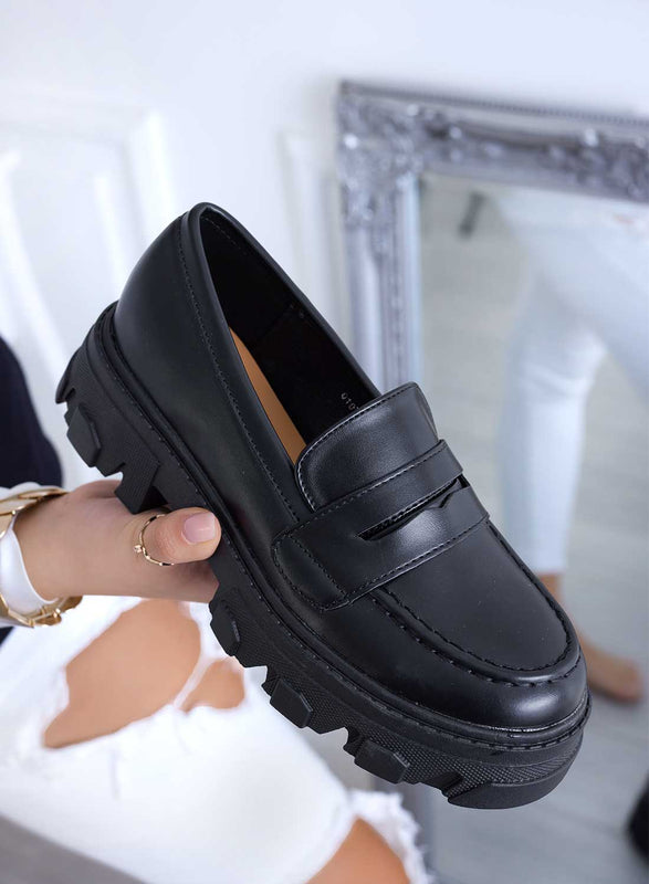 Mocassini neri con suola carrarmato