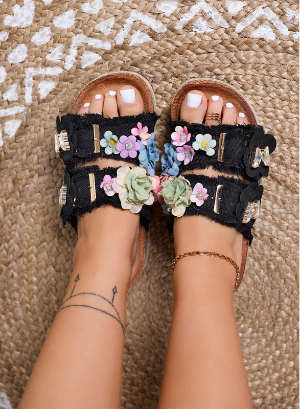 ALIBY - Black slide sandals with colorful flowers and jeweled details on a cork sole