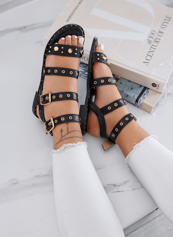 LILY - Black low sandals with snake print effect, studs, and buckles