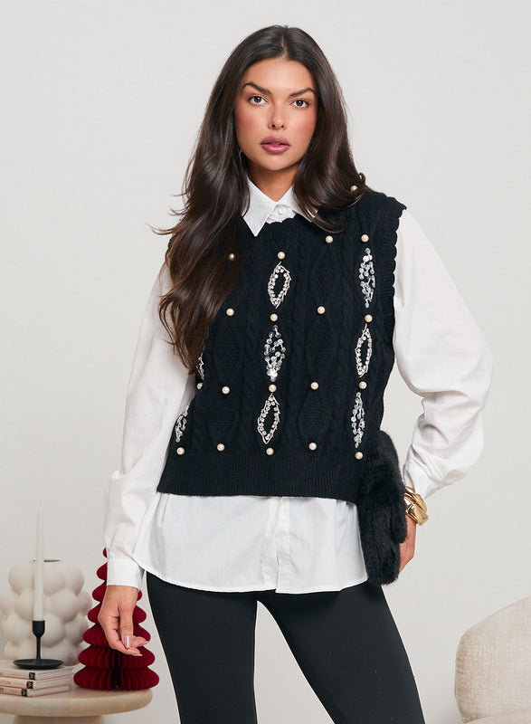 Pantalones negros bootcut decorados con strass