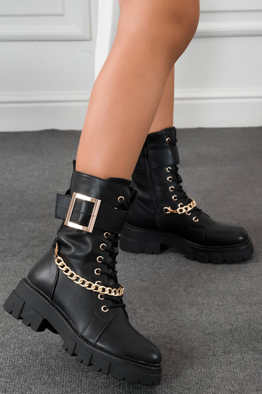BRISA -  Black ankle boots with gold buckle and chain