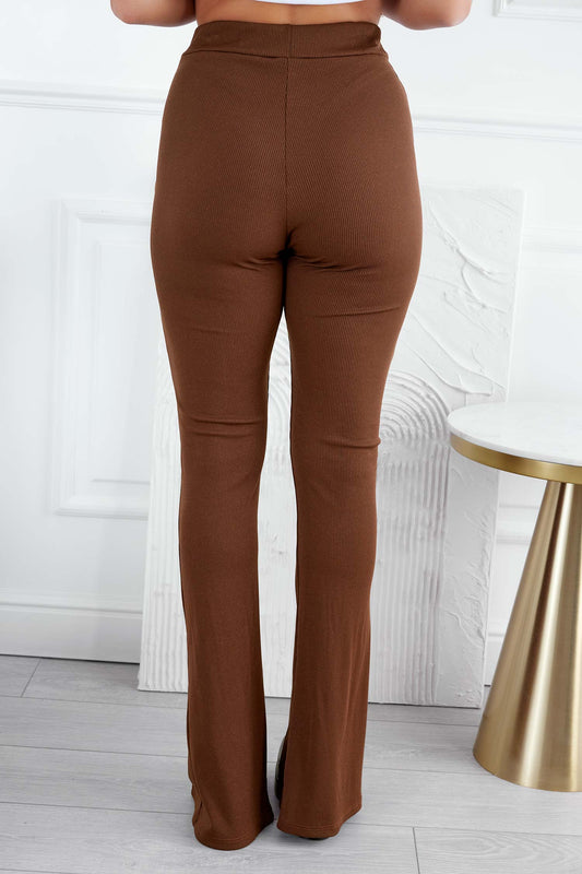 Brown ribbed trousers with slit