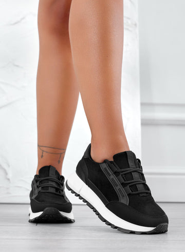 Black sneakers in lightweight fabric