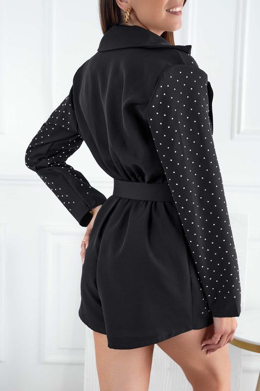 Black short jumpsuit with deep neckline and rhinestones