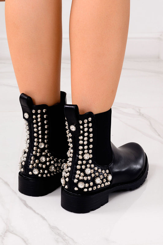 Black ankle boots with side spring and studs