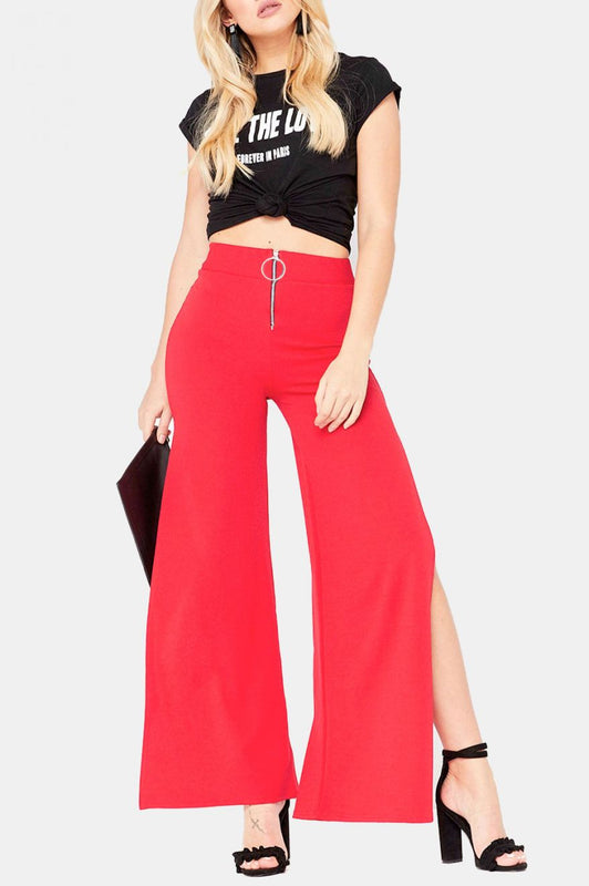 Red trousers with zip and side slits