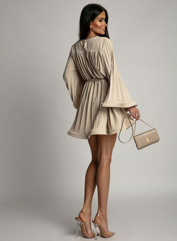 Beige pleated dress with a waist tie