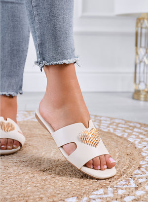 IGGY – Beige slide sandals with gold heart appliqué