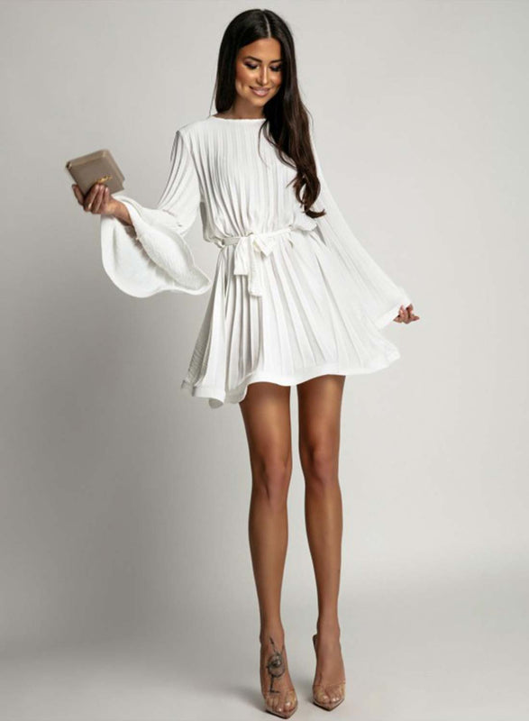 White pleated dress with a waist tie