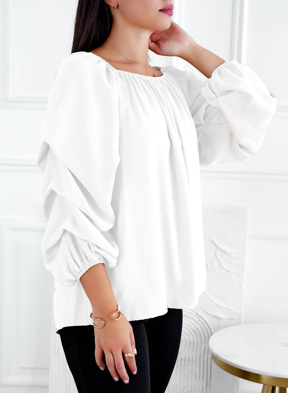 White blouse with ruffled sleeves