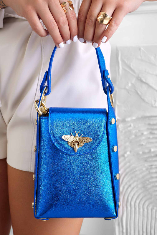 Metallic blue handbag with studs and removable shoulder strap