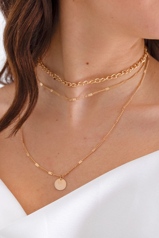 Gold necklace with 3 rounds