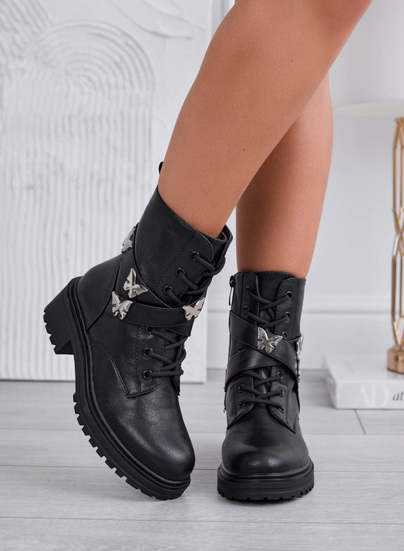 IVON - Bottines noires style militaire avec papillons argentés