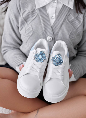 White sneakers with light blue heel and jewel
