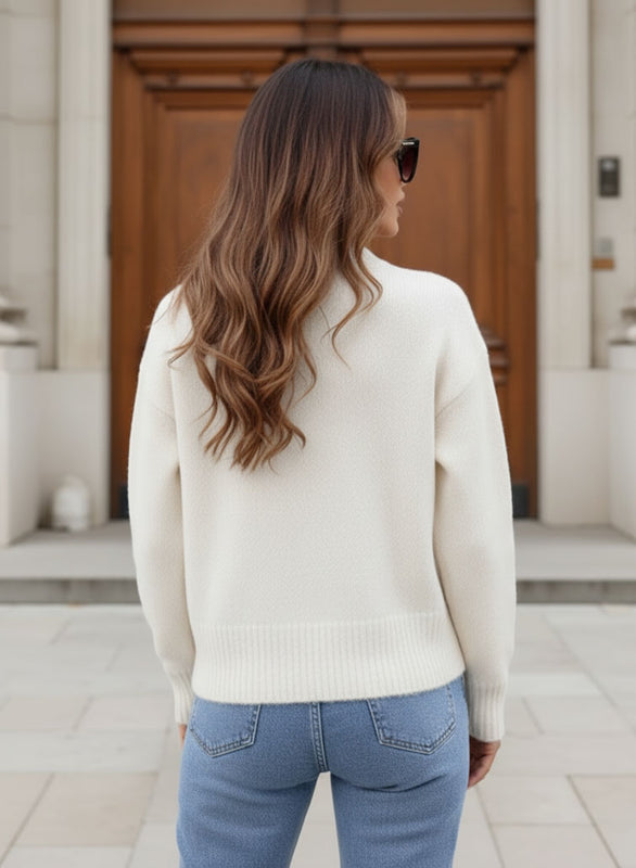 Beige sweater with pearls and pink bows