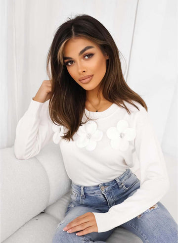 Maglia bianca con fiori applicati