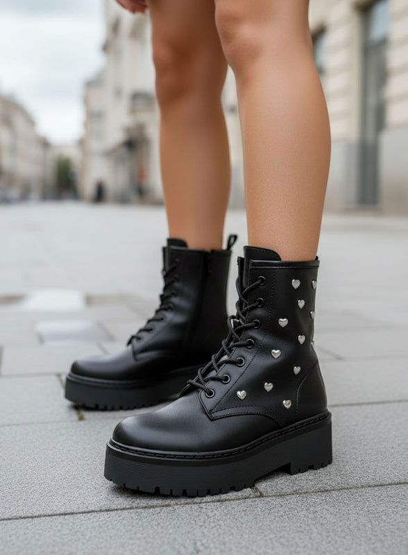 ODESSA - Black combat ankle boots by Alexoo with silver heart appliqués