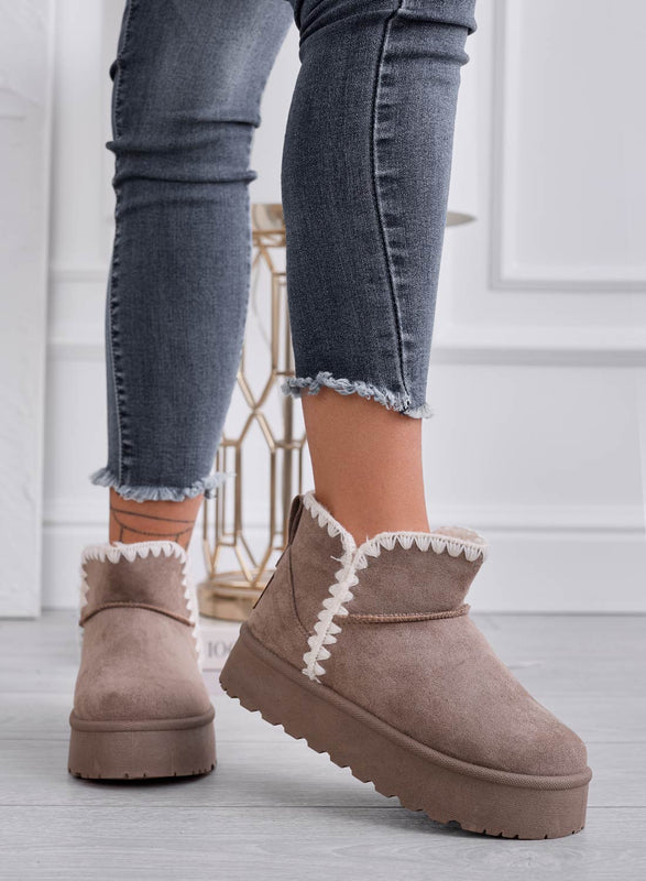 Padded mud ankle boots with embroidered edge