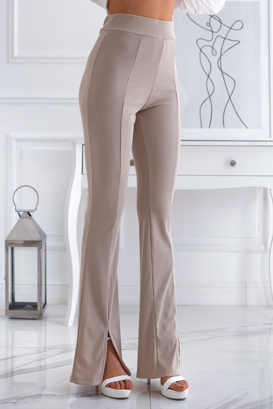 Beige flared trousers with front slit