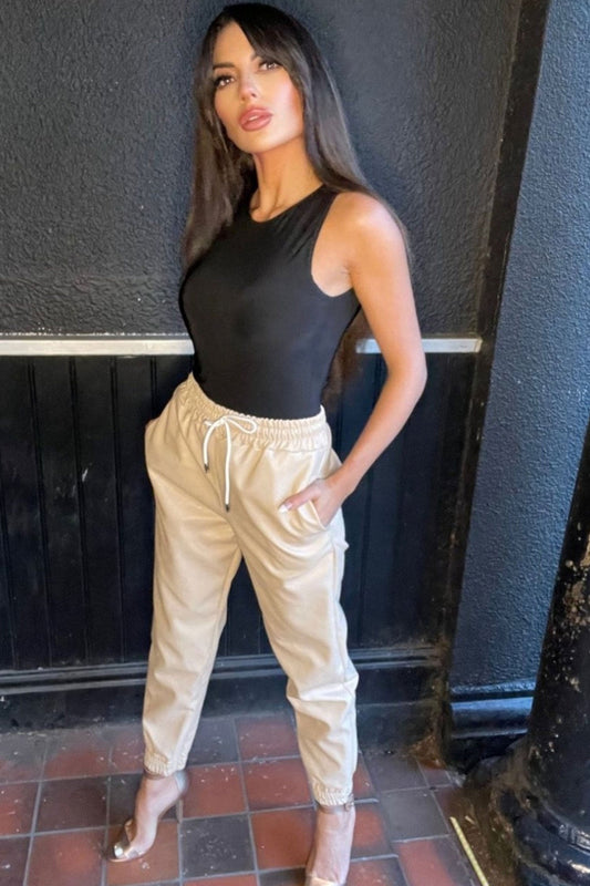 Beige faux leather joggers