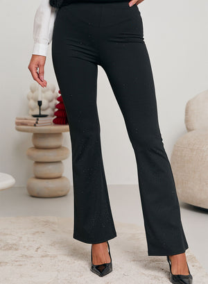 Black bootcut pants decorated with rhinestones