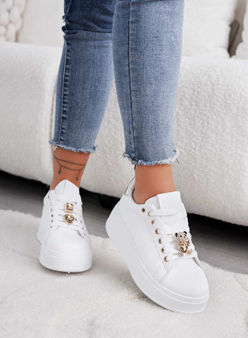White sneakers with jewel applications and gold teddy