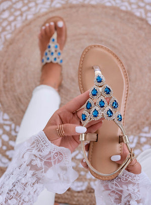 STEVEN - Gold jeweled thong sandals with blue stones