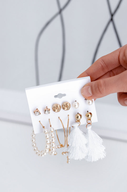Set of six white and gold earrings