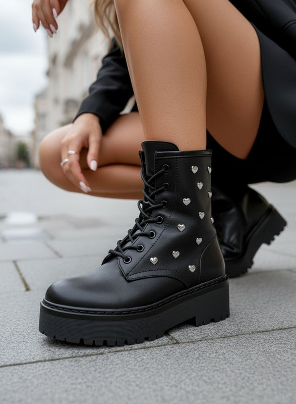 ODESSA - Black combat ankle boots by Alexoo with silver heart appliqués