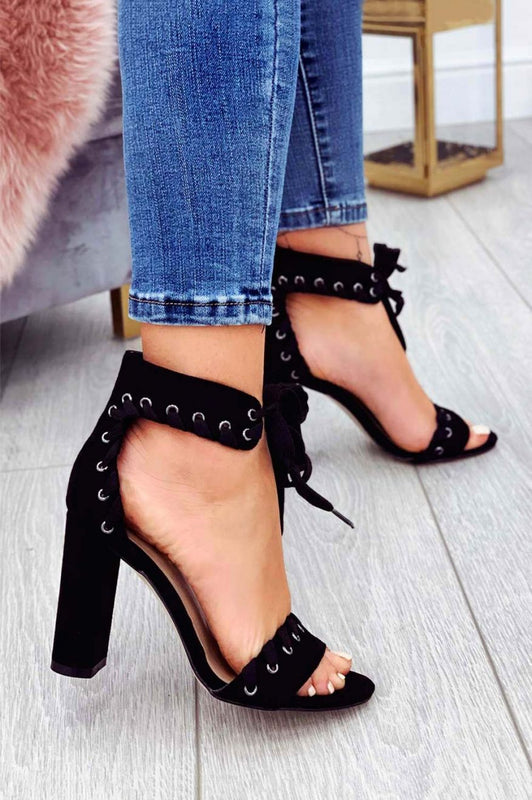 Black suede sandals with comfortable heel and strap